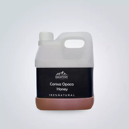 Golden Carissa Opaca raw honey in plastic jar - 1000g